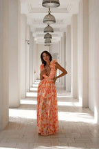Amira – Backless Maxi Dress with Floral Pattern, Ruffles and Cut-Outs