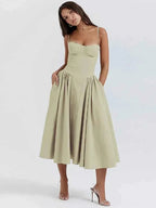 Clara – Midi dress with corset top, spaghetti straps, and flared skirt