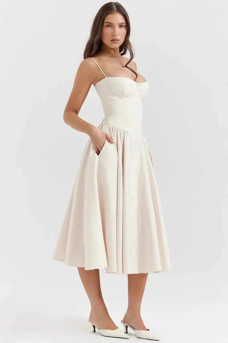 Clara – Midi dress with corset top, spaghetti straps, and flared skirt