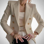 Double-breasted women's blazer with gold buttons