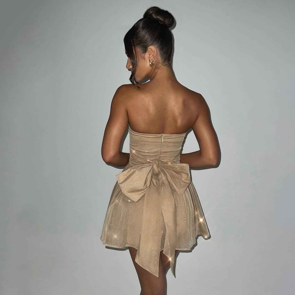 Mira – Sparkling off-shoulder tulle mini dress with bow detail