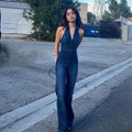 Nina – Denim jumpsuit with halter neck and zipper in dark wash