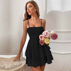 nola – tiered ruffle mini dress with spaghetti straps & back bow