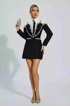 Vivienne – tailored boucle mini dress with pearl embellishments and blazer-style collar